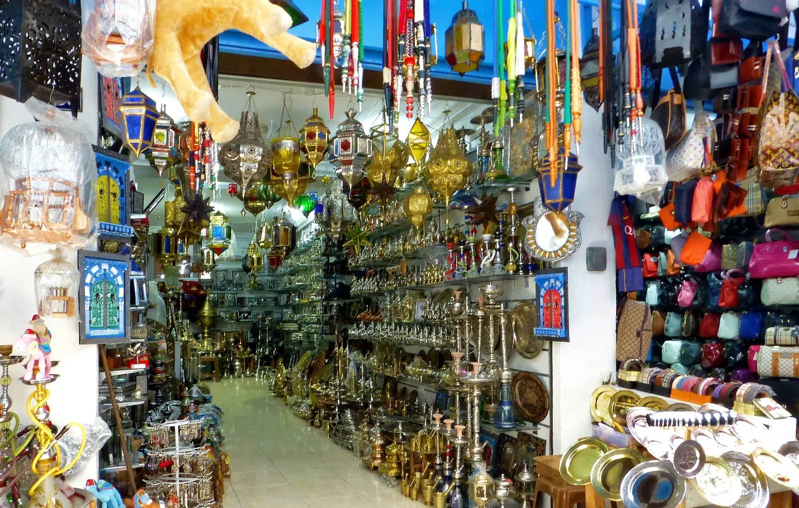 Lanterns and textiles in a covered souk of the Tunis medina