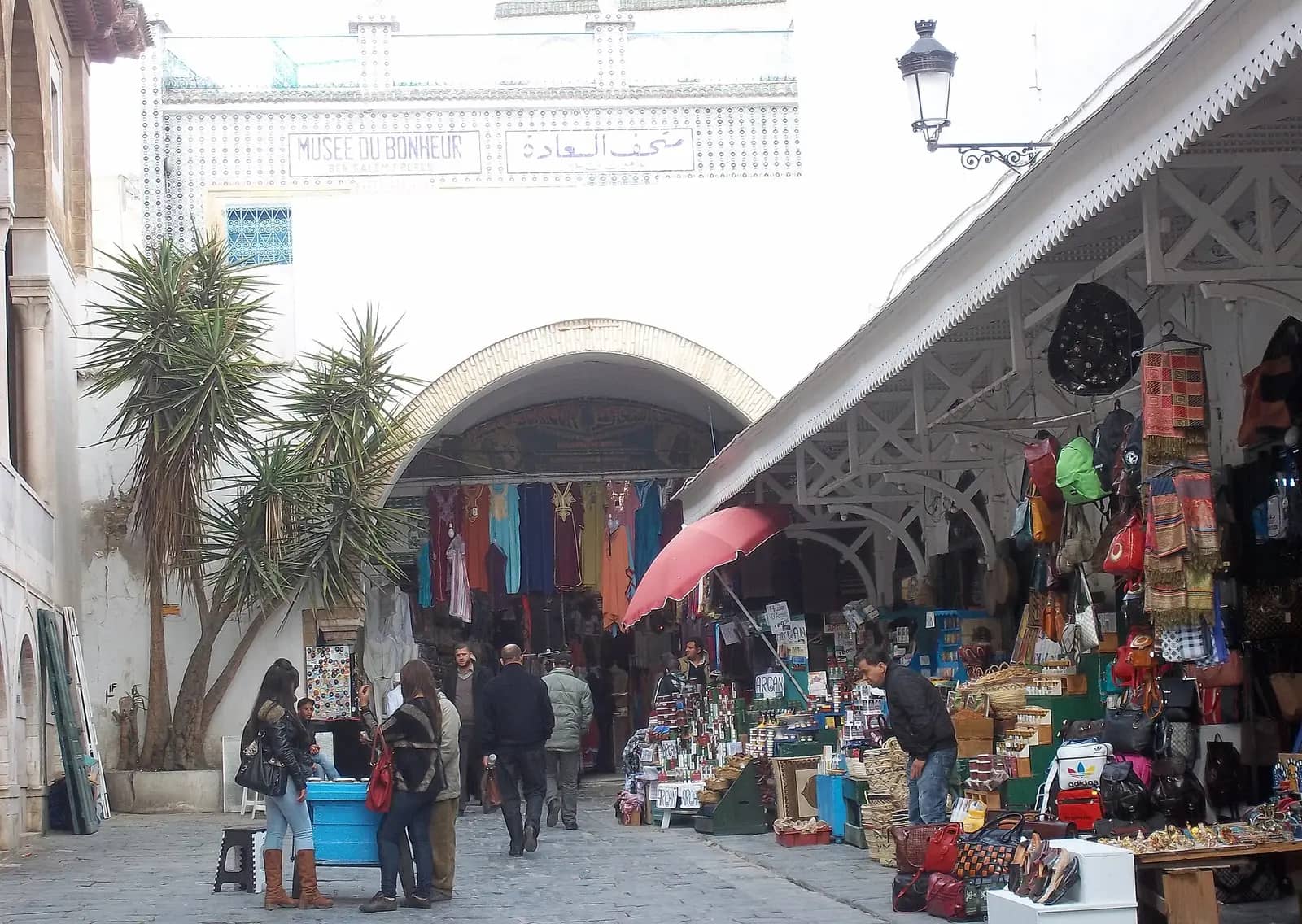 Shops and an arched gateway in the Medina of Tunis
