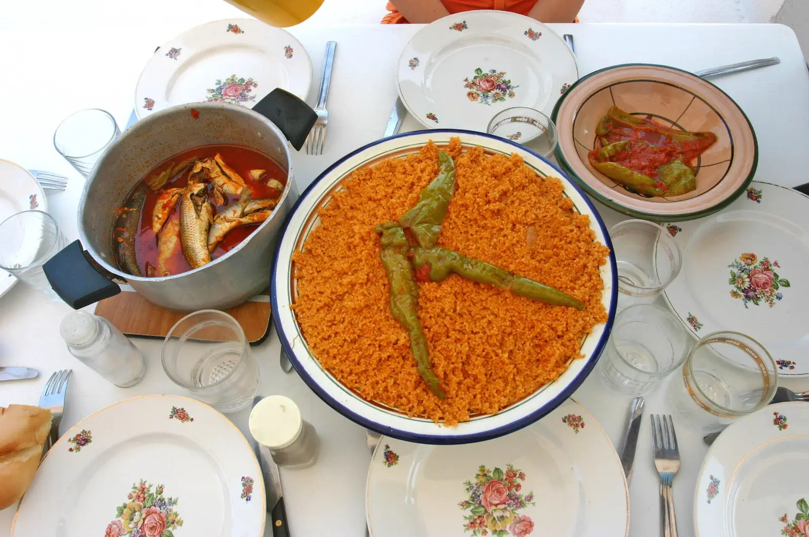 A dish of Tunisian fish couscous with green peppers